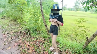 Thai chick ambles and shows her labia on the side of the road. Clear Thai voice.